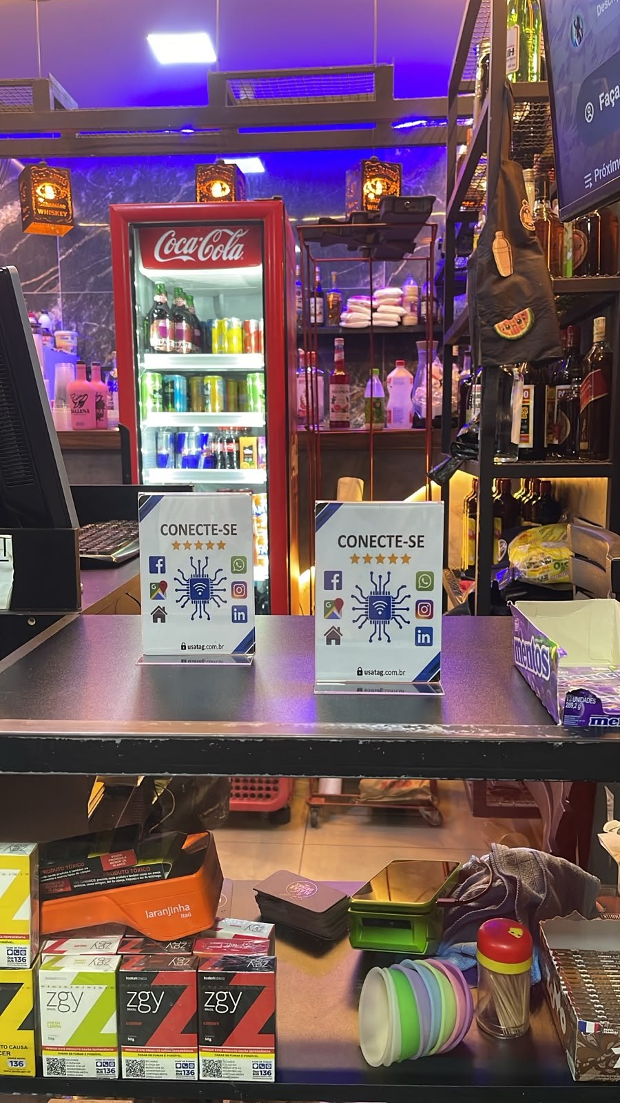 Displays USATAG no balcão de um cliente real
